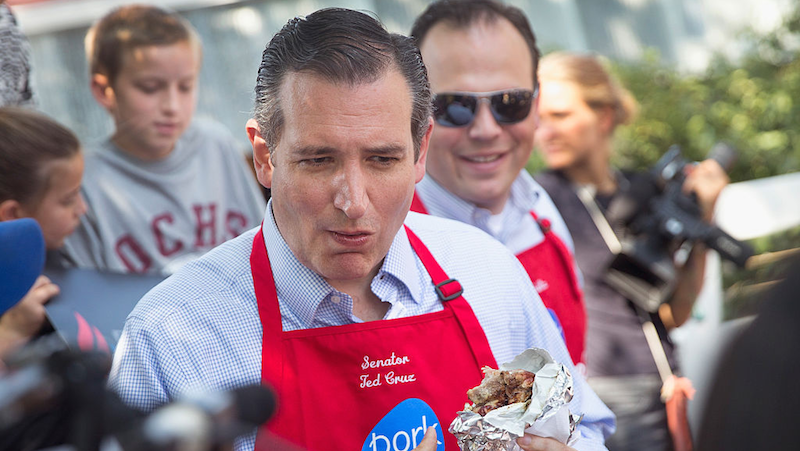 You can tell this Iowa State Fair pork chop tastes good because of how his mouth can’t close all the way.